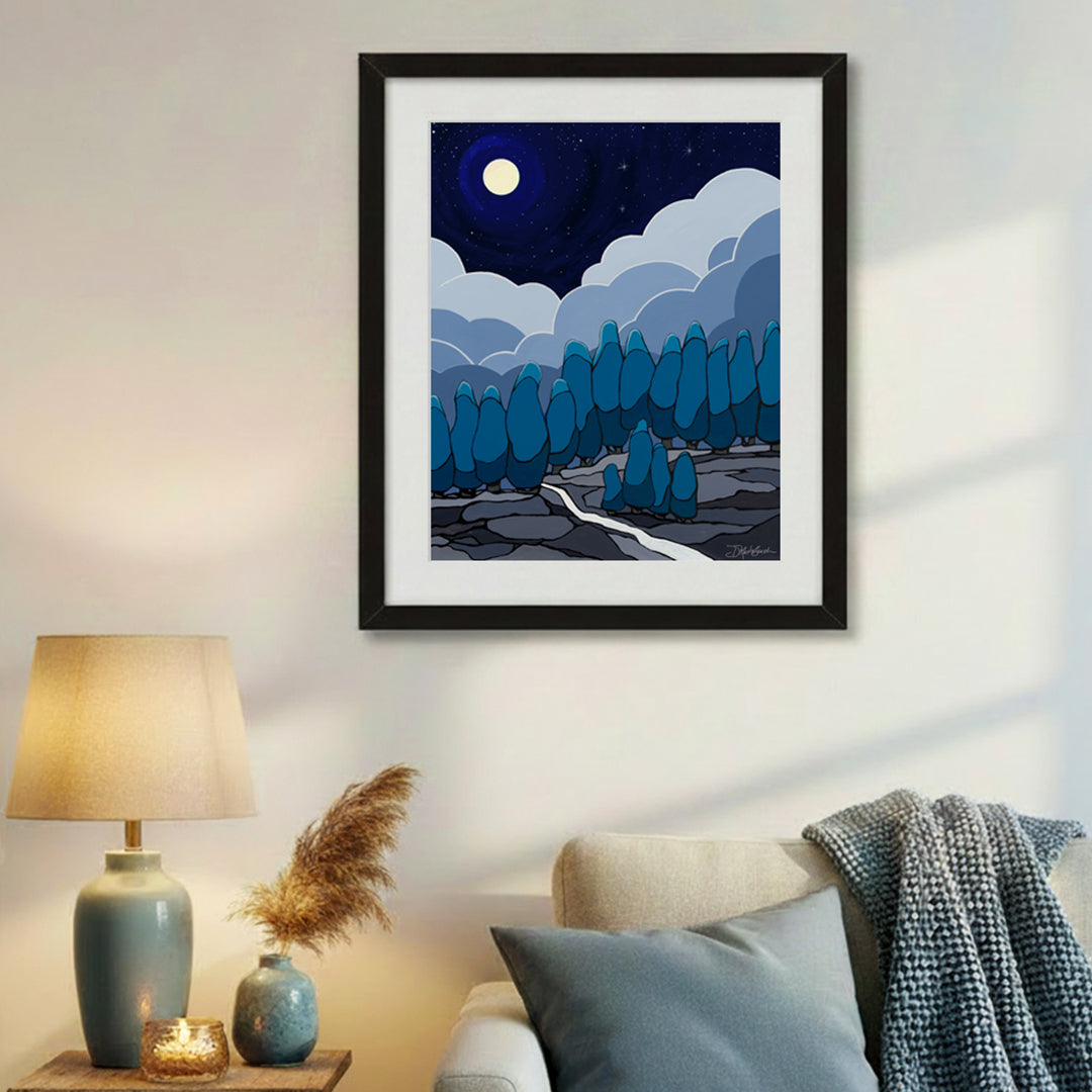 "Storm Clouds Rising" limited edition print of an acrylic painting by Denise Marta-Burch hangs in a home.
